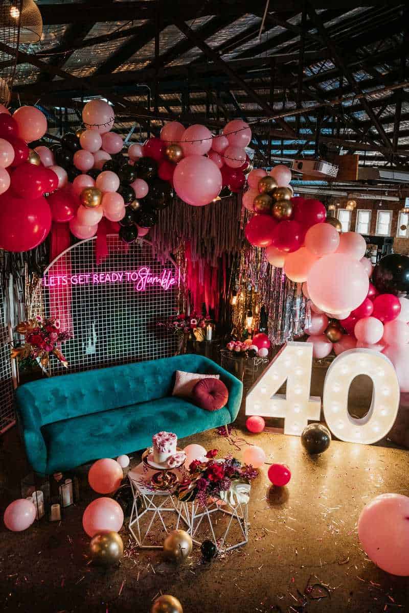 A modern twist to a moody birthday decor for a woman in 40s.